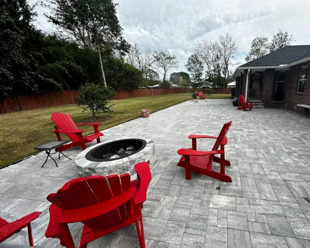 Paver fire pit area with chairs